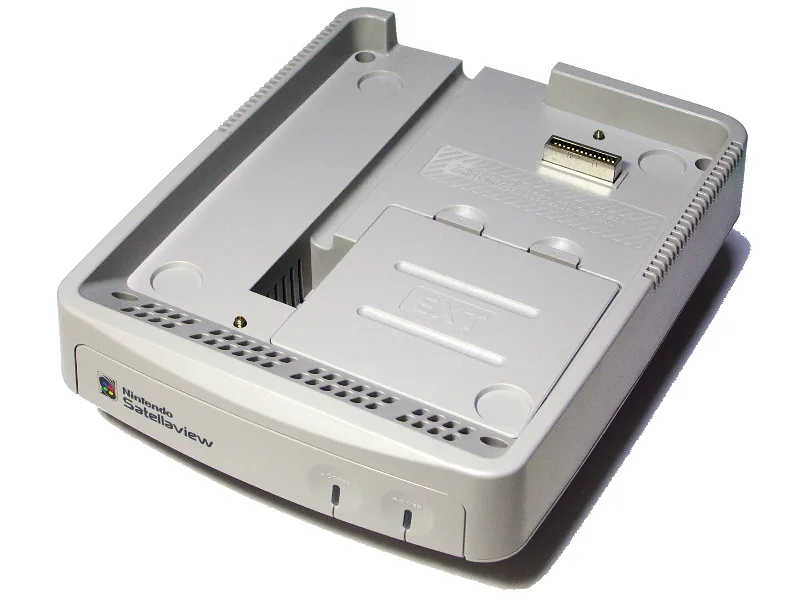 The Satellaview main unit seen from above and the front, with its top bay and expansion connector