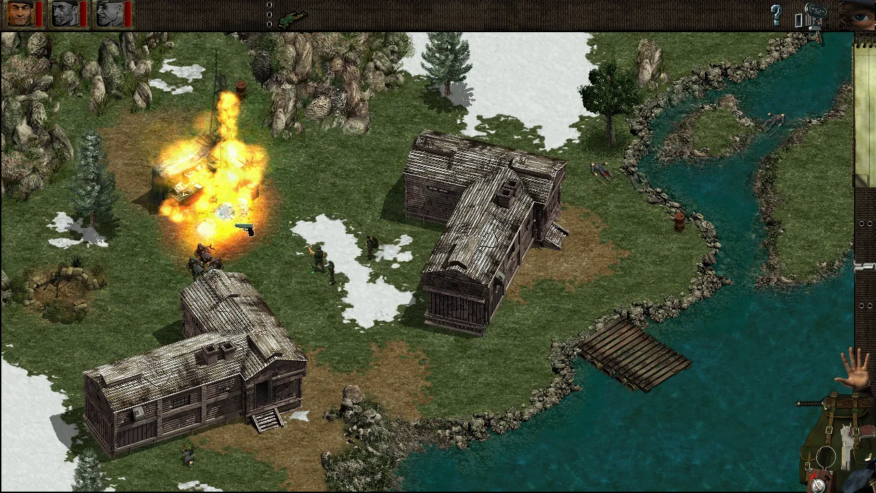 Isometric view of wooden cabins by a river with an explosion and small figures in Commandos: Behind Enemy Lines