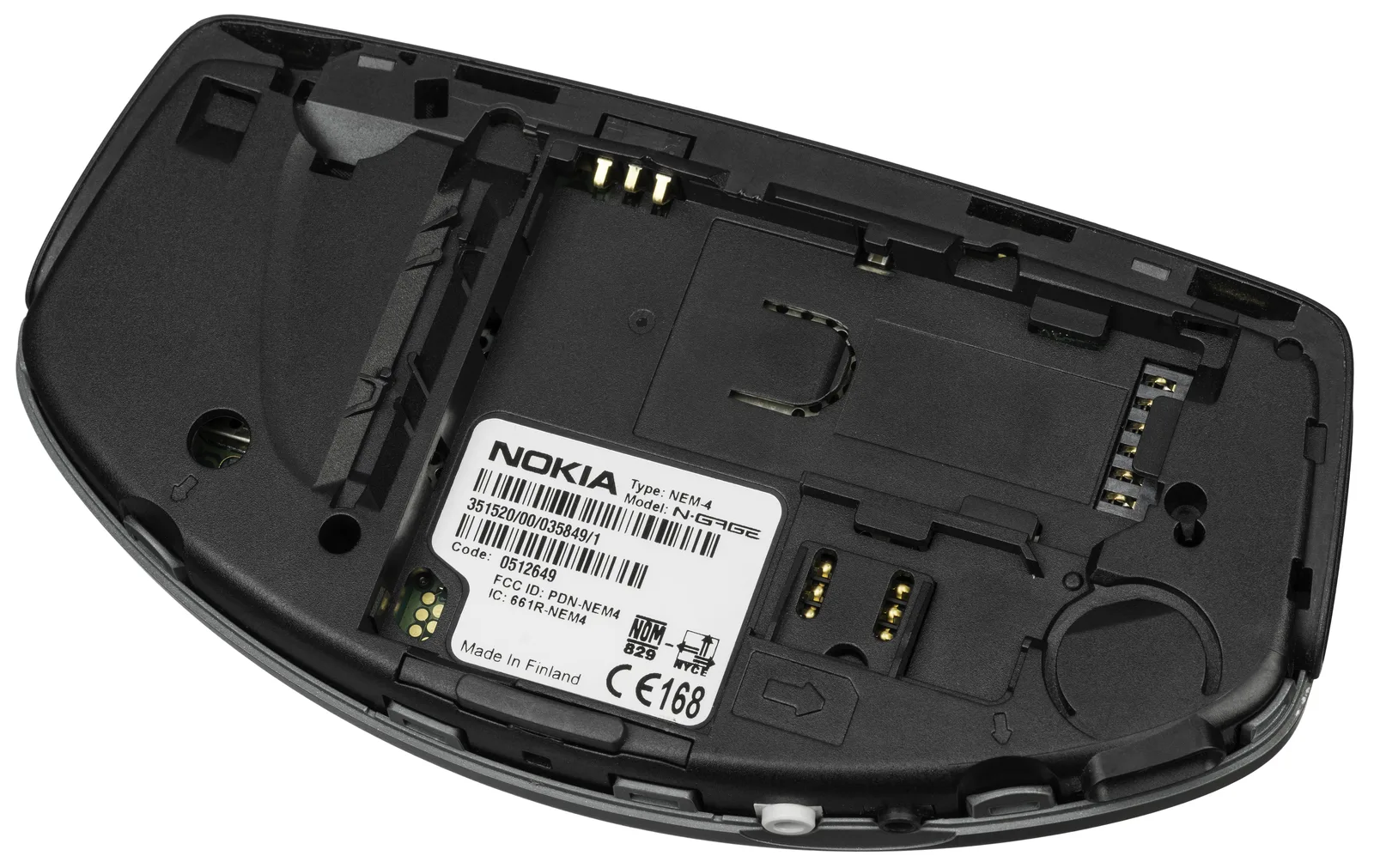 Back of the Nokia N-Gage with the battery removed, showing the empty compartment, SIM slot and Nokia label