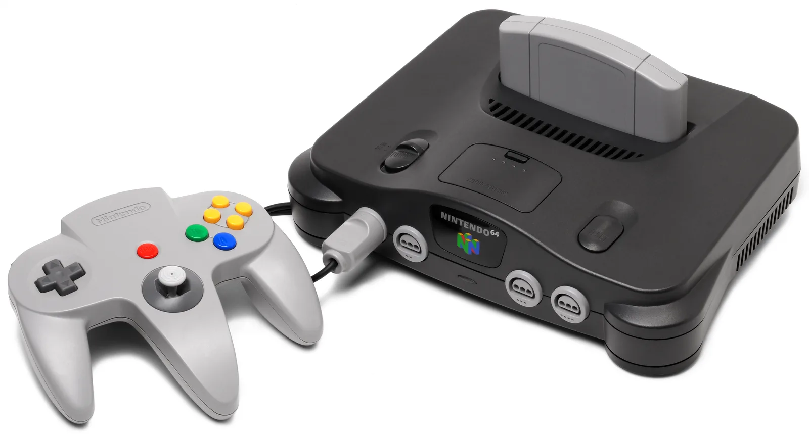 A Nintendo 64 console with a cartridge in its slot and a gray controller plugged into the first port